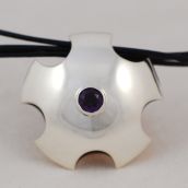 Scalloped silver pendant with amethyst